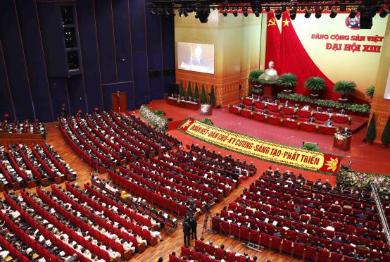ပုံစာ- ၂၀၂၁ ခုနှစ် ဇန်နဝါရီ ၂၆ ရက်က ဟနွိုင်းမြို့တော်တွင် ဗီယက်နမ်ကွန်မြူနစ်ပါတီ၏ အမျိုးသားလွှတ်တော်အစည်းအဝေး ဖွင့်ပွဲအခမ်းအနားကို တွေ့ရစဉ်။ (Photo-AFP)